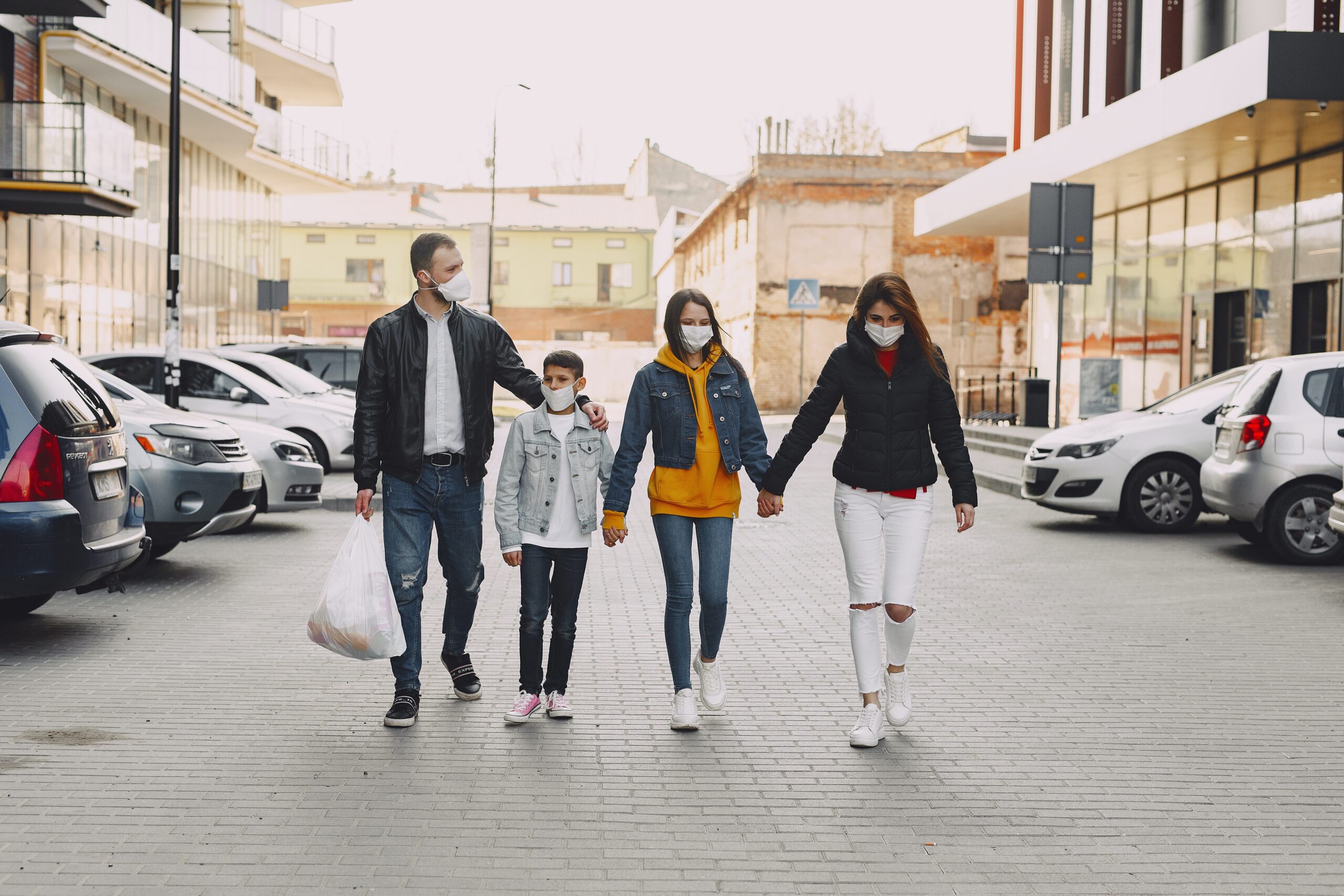 Family entering Grocery Store