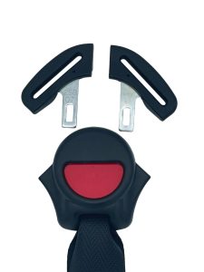 Front view of a black Evenflo Convertible car seat buckle with a red release button and slots for straps.