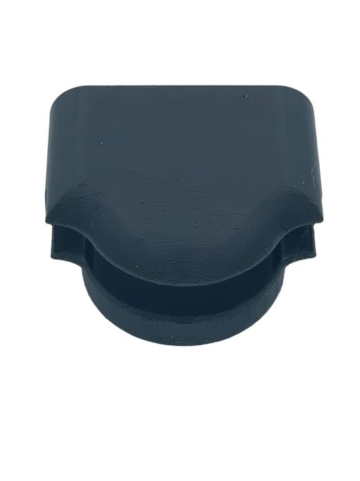 Overhead view of a black Evenflo Convertible car seat guard with a textured surface.