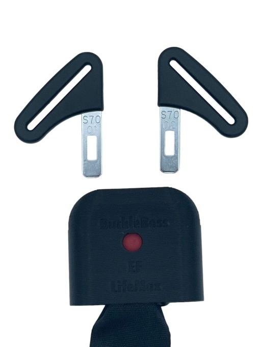 Top view of an Evenflo Lifemax seat belt clip in black with distinctive angular design and metal inserts.