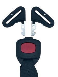 Detailed view of the Evenflo Revolve seat belt lock button on the car seat