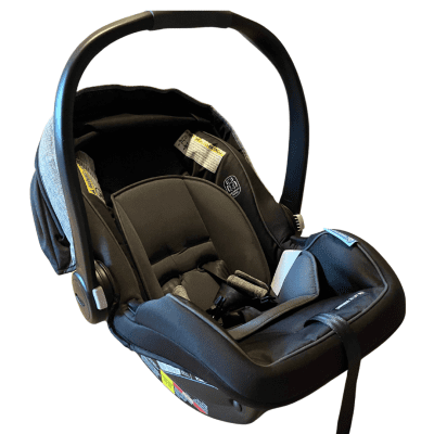 A modern Graco car seat designed for child safety, featuring a padded seat with adjustable straps and a secure five-point harness system.